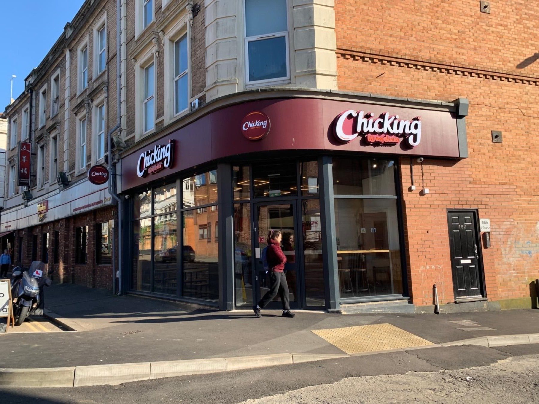 The completed Chicking restaurant at a prominent Bournemouth town-centre corner — glazed frontage and branded fascia