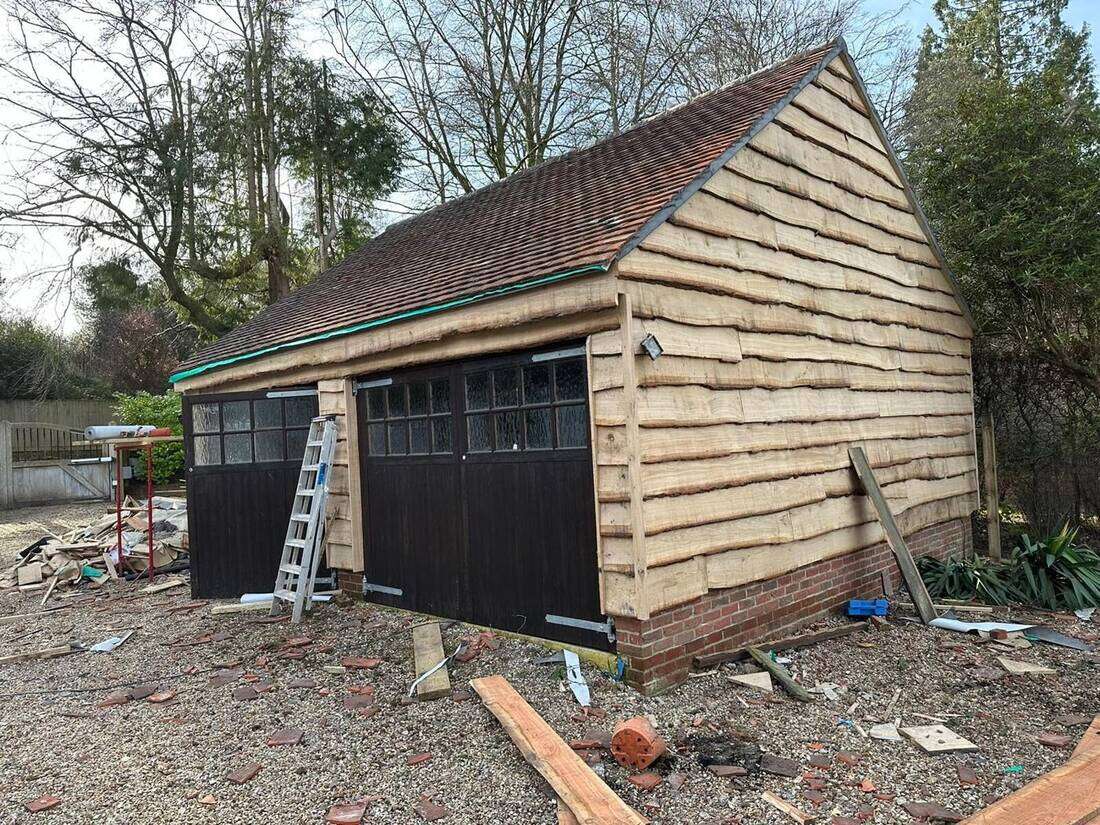 Waney-edge timber cladding, after
