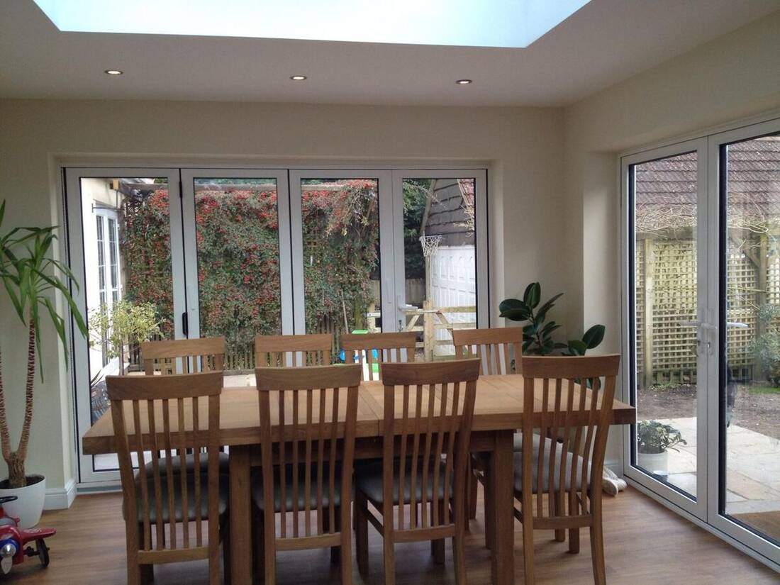 Kitchen-diner extension with sliding doors and rooflight