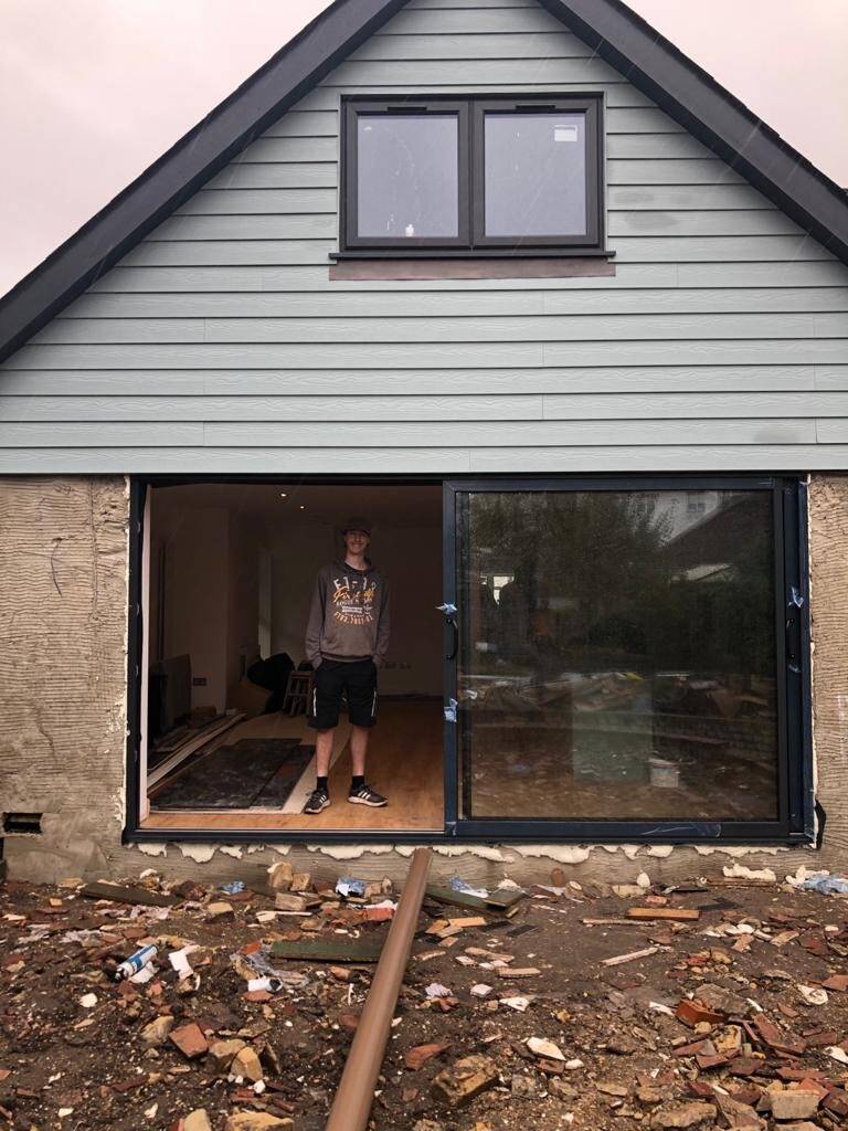 New sliding doors in a clad rear extension