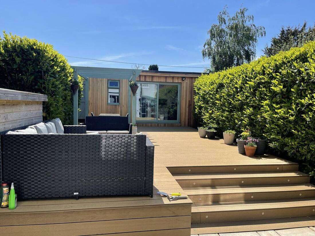 Garden room behind a new raised deck