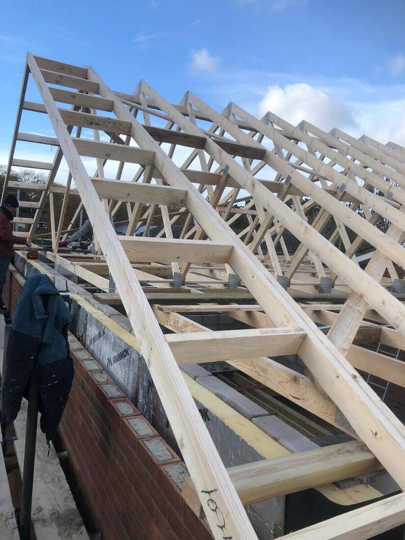 Roof structure tied into the existing house