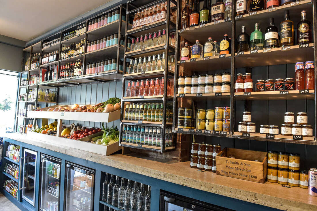 Full-height shelving and fridges