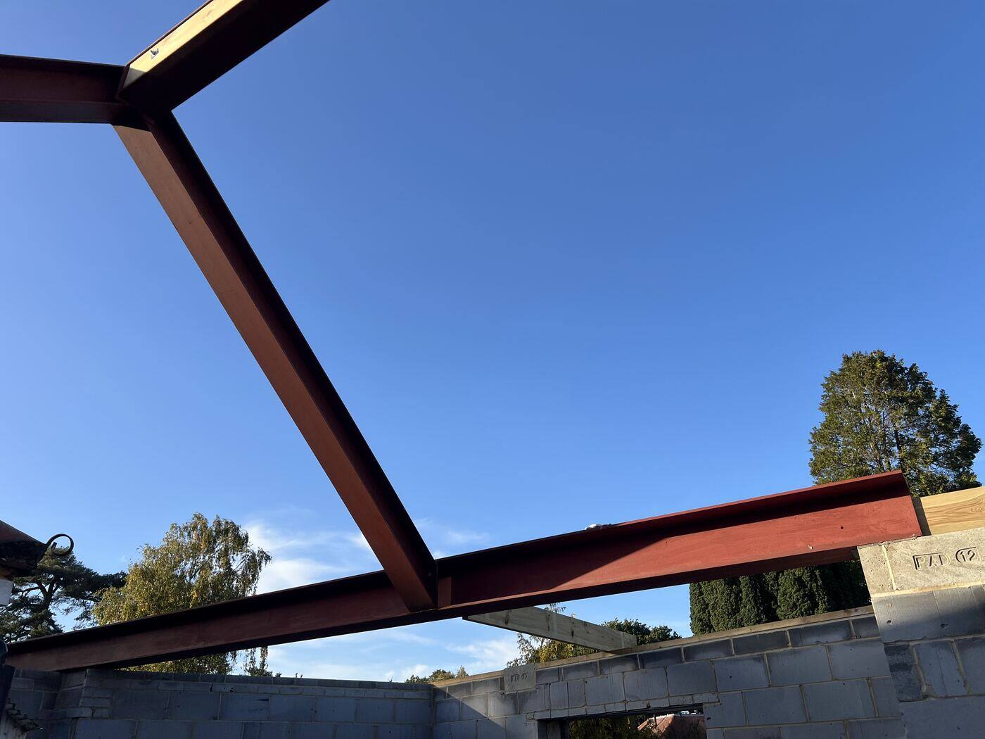 Steel frame going up over a new extension